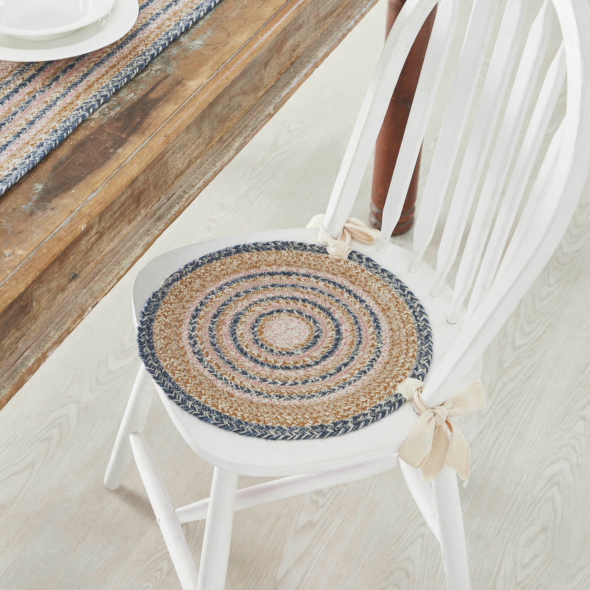 https://bethscountryprimitivehomedecor.com/cdn/shop/products/83453-Kaila-Jute-Chair-Pad-15-inch-Diameter-detailed-image-1_2400x.jpg?v=1676768969